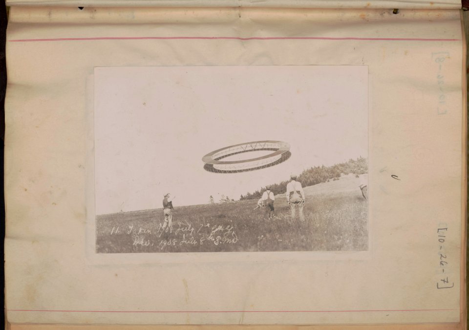 Alexander Graham Bell (right) and his assistants observing the progress of one of his tetrahedral kites LCCN00650258