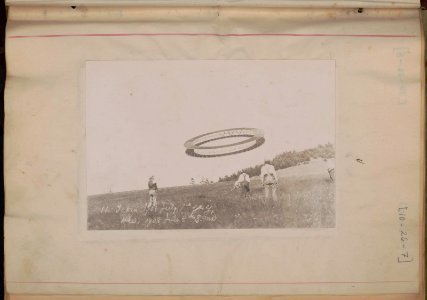 Alexander Graham Bell (right) and his assistants observing the progress of one of his tetrahedral kites LCCN00650258