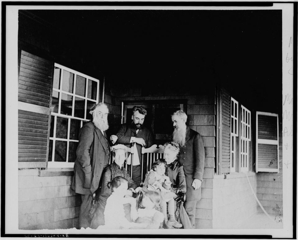 Alexander Graham Bell, his wife and daughters, with Mr. and Mrs. Alexander Melville Bell and Mr. and Mrs. Gardiner Greene Hubbard on porch at Manchester-by-the-Sea LCCN00650250