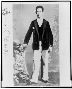 Alfred E. Smith, full-length portrait, between the ages 17 and 27, standing, facing slightly left LCCN97508795