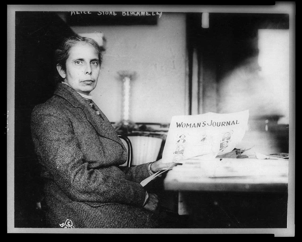 Alice Stone Blackwell, half-length portrait, seated, facing right, holding copy of Woman's Journal, of which she was editor LCCN97500094