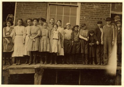 All (except smallest boy) work in Sweetwater Hosiery Co. He is a dinner carrier, but others like him and smaller work in these knitting mills of this region. LOC nclc.01987