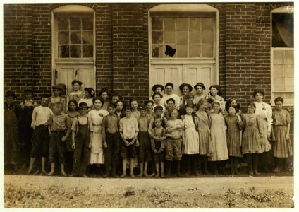 All are workers in Roanoke Cotton Mills (Va.) Smallest boy in the middle helps. See label No. 2162. LOC nclc.02152