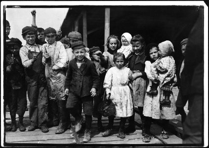 All these children except babies shuck oysters and tend babies at the Pass Packing Co. I saw them all at work there... - NARA - 523405