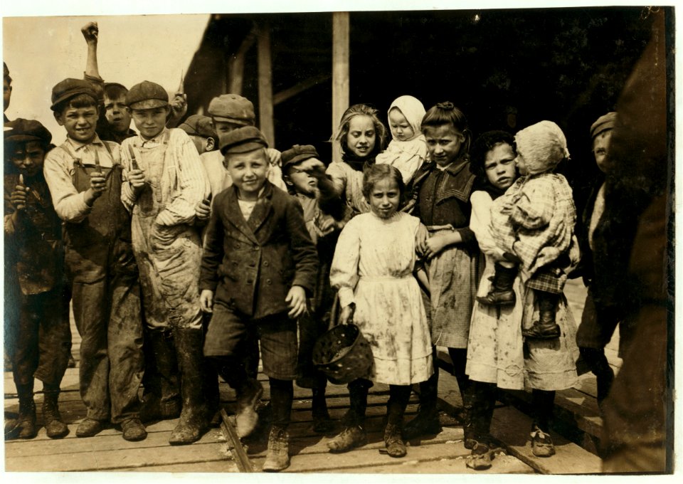 All these children (except babies) shuck oysters and tend babies at the Pass Packing Co. I saw them all at work there long before daybreak. Photos taken at noon in the absence of the Supt. LOC nclc.00859