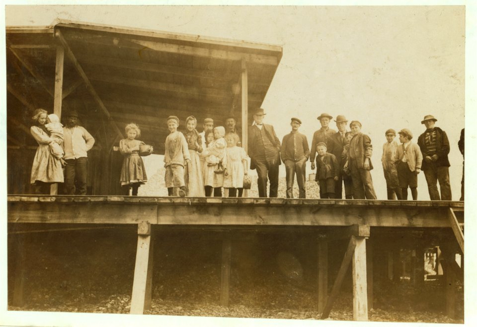 All these children were shucking oysters and tending babies at the Pass Christian Company. (Dunbar, Lopez, Dukate Co.) before daybreak and until about 5 P.M. Photos taken at noon in absence LOC nclc.00861