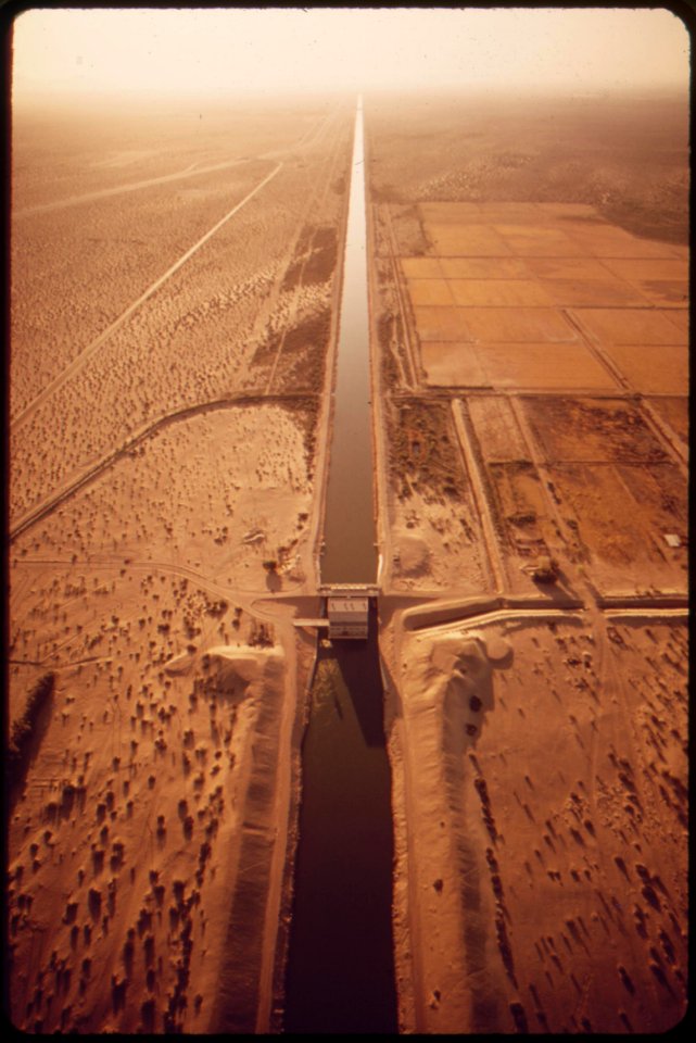 All-american-canal-feeding-thirsty-imperial-valley-with-water-from-the-colorado-river-mexico-on-left-may-1972 6990371772 o