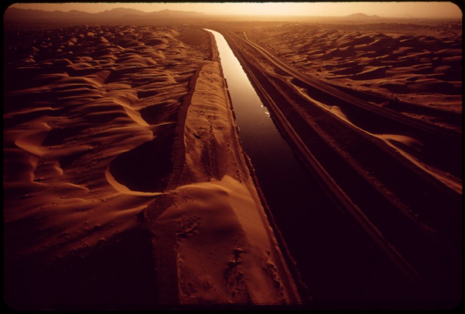 All-american-canal-carries-colorado-river-water-through-sand-swept-area-of-the-imperial-valley-may-1972 7152581047 o