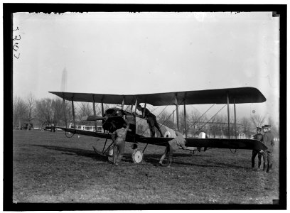 ALLIED AIRCRAFT. DEMONSTRATION AT POLO GROUNDS. COL. CHARLES E. LEE, BRITISH AVIATOR, WITH AVRO TRAINING PLANE DESIGNED BY A.V. ROE OF ENGLAND LCCN2016868896