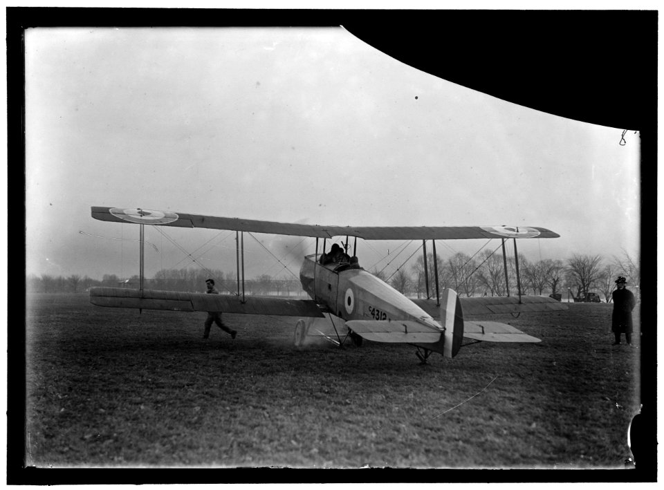 ALLIED AIRCRAFT. DEMONSTRATION AT POLO GROUNDS. COL. CHARLES E. LEE, BRITISH AVIATOR, WITH AVRO TRAINING PLANE DESIGNED BY A.V. ROE OF ENGLAND LCCN2016868900