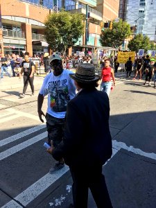 Alma Adams greeting protestor - 2016