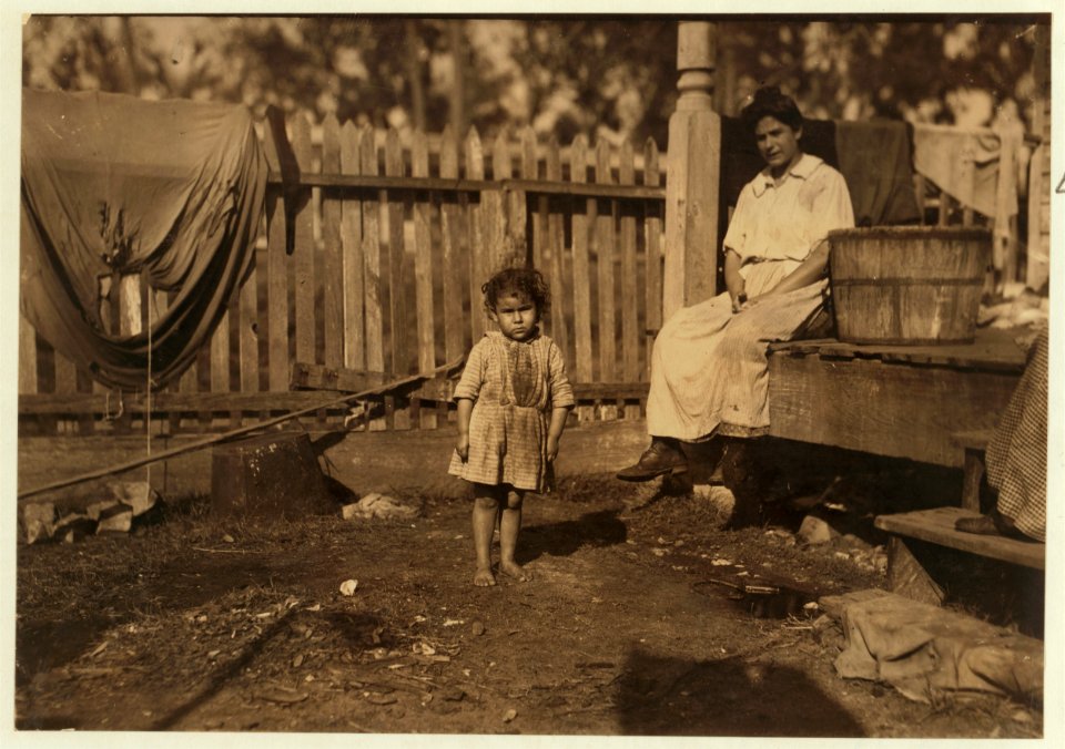Alma Crosien, three-year-old daughter of Mrs. CoRa Croslen, of Baltimore. Both work in the Barataria Canning Company. The mother said, 'I'm learnin' her the trade.' LOC cph.3a01068