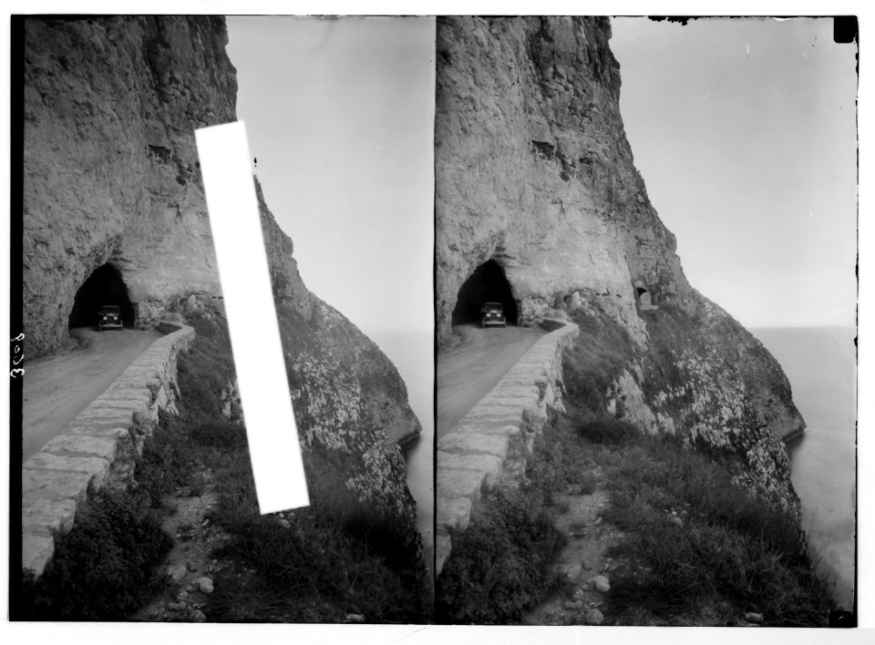 Along the coast to Tripoli. Ras Esh Shekka. Exit of road and double tunnel through the cliff LOC matpc.02851
