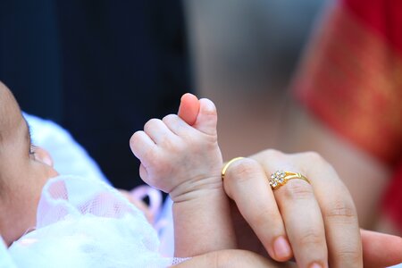 Hands newborn care photo