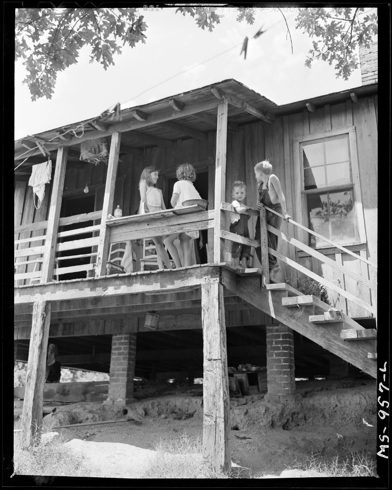Back porch of home of Carlos Wilson, miner, who lives in company housing project. Consolidated Coal Company, Bankhead... - NARA - 540628