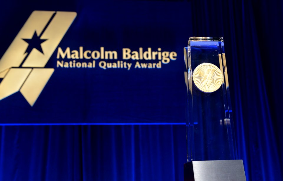 Baldrige Award Crystal with MBNQA backdrop, 2013 Baldrige Award Ceremony, April 6, 2014 (13887406957)