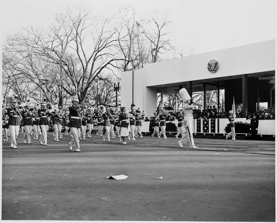 Band passes in front of President Truman and Vice President Alben Barkley during the inaugural parade. - NARA - 200057