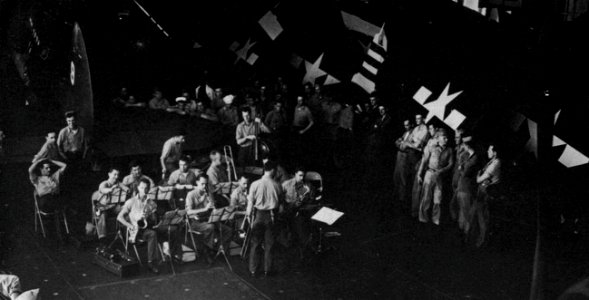 Band playing in the hangar of USS Randolph (CV-15), in 1945