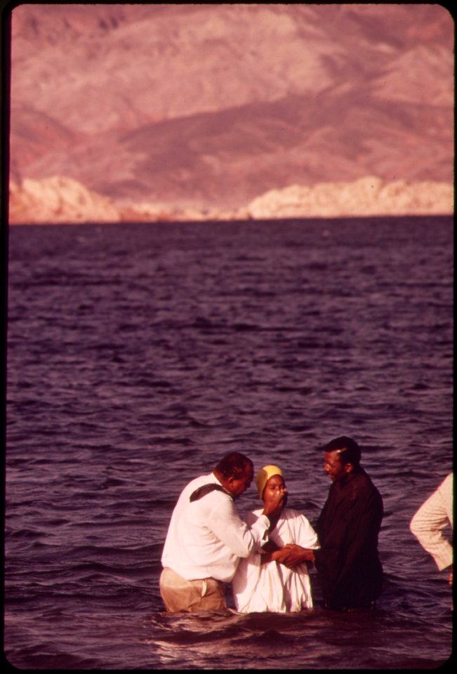 Baptism-ceremony-performed-by-members-of-the-church-of-god-in-christ-of-north-las-vegas-may-1972 7152630357 o