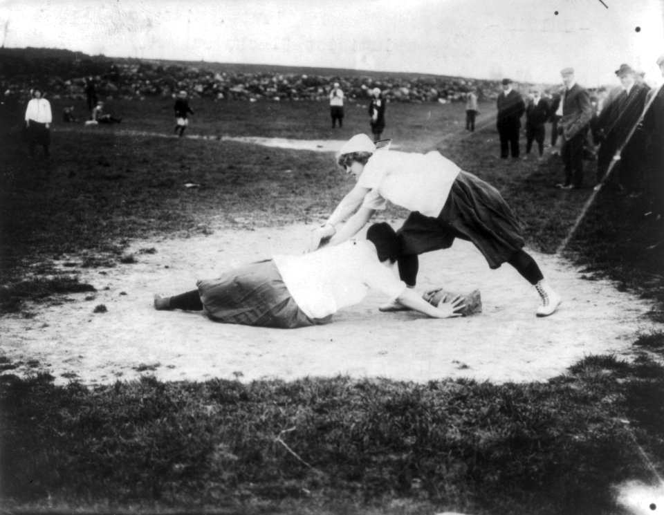 Baseball - New York Female Giants- Miss Schnall, catcher, and Miss Slachu with hands on home plate LCCN2004679530 (cropped)