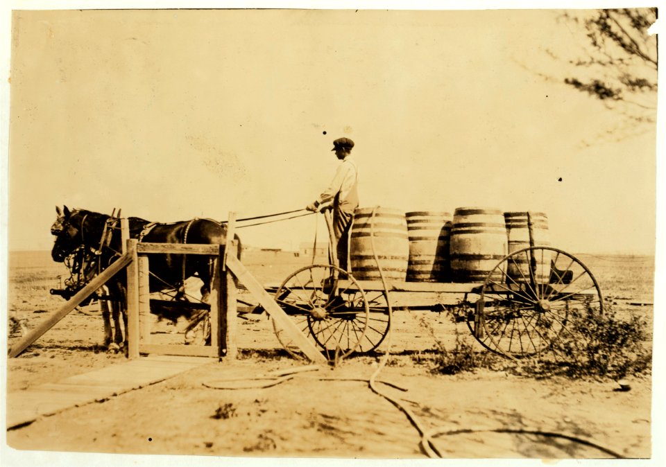 14-year-old boy hauling water on farm near Lawton. Francis Heinz, Route B, Box 11. LOC nclc.00678