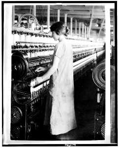 14-year old spinner in Berkshire Cotton Mills. LOC cph.3c01570 photo
