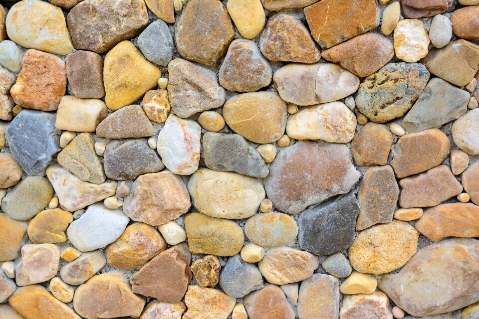 Pebble stone walls background