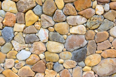 Pebble stone walls background photo