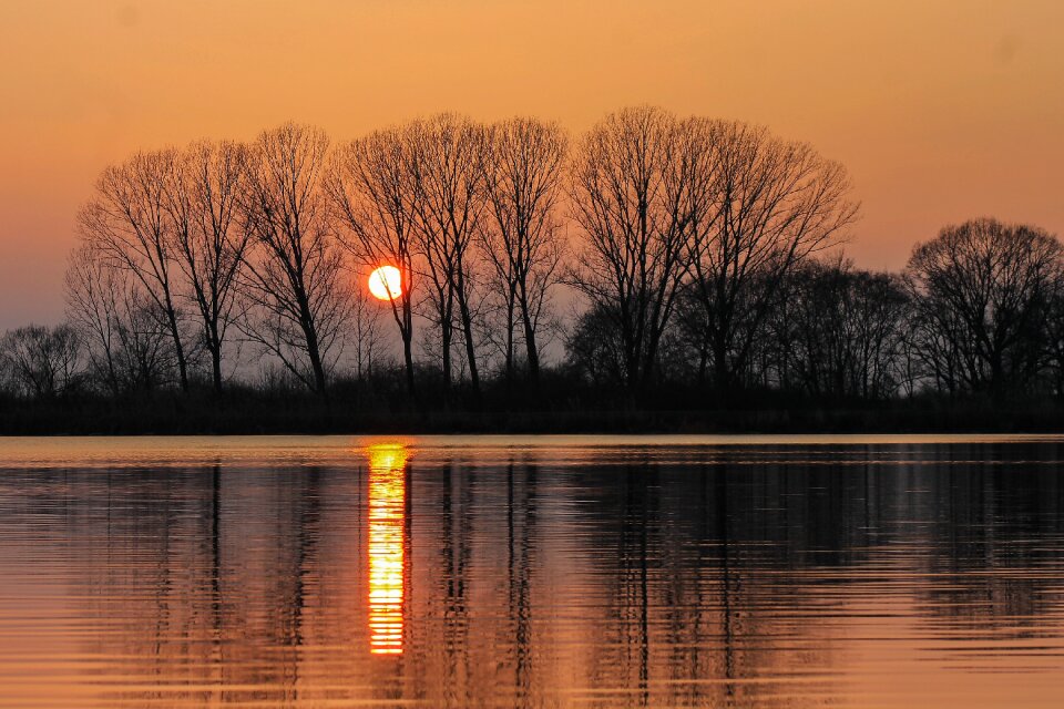 Reflection waterfront sunset landscape