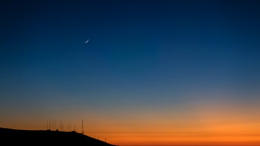 Mountain silhouette moon