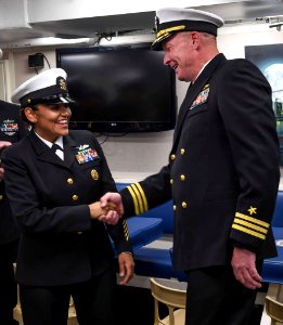 170427 - CAPT Fortson gives CMDCM (SW) V.C. Holliday a handshake
