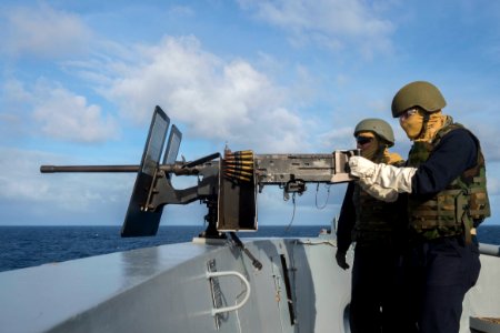 170624-N-ZL062-008 - PO2 Gage Murphy fires M240B aboard USS Green Bay (LPD-20)