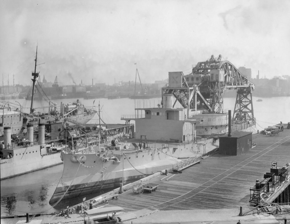 US Crane Ship No.1, ex-Kearsarge (BB-5) in South Boston, with The USS James K Paulding (DD-238) appears to her starboard side, circa 1925. (49933965033)