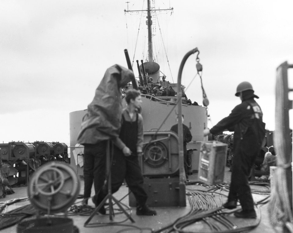 USS FREDERICK C DAVIS (DE-136) Crew members of at work, on the ship's fantail, during the Anzio Operation, 21-22 January 1944. (50326542303)