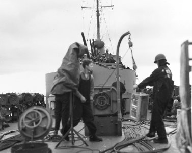 USS FREDERICK C DAVIS (DE-136) Crew members of at work, on the ship's fantail, during the Anzio Operation, 21-22 January 1944. (50326542303)