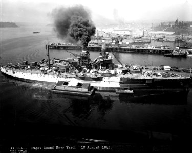 USS Utah (AG-16) At the Puget Sound Navy Yard, 18 August 1941. She has been rearmed and partially repainted into Measure 1 camouflage (50297679396)