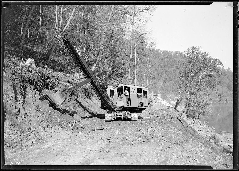 Power shovel making roadway at Norris Dam site. - NARA - 532698