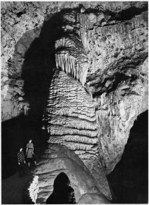 Rock formation with women, dark background, 'The Rock of Ages, Big Room,' Carlsbad Caverns National Park, New Mexico. - NARA - 520023