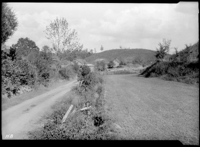 Sevier County, Tennessee. This view reveals the rolling landscape. Many farms have a little level land and much of... - NARA - 532632