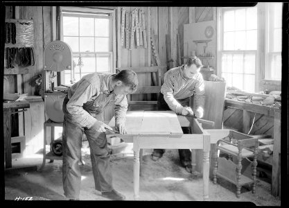 Shop of the Woodcrafters and Carvers, Gatlinburg, Tennessee. Besides making fine furniture, these two craftsmen turn... - NARA - 532771