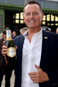 Ambassador Richard Grenell with a bottle of Korbel California Sparkling Wine, 4th of July 2019
