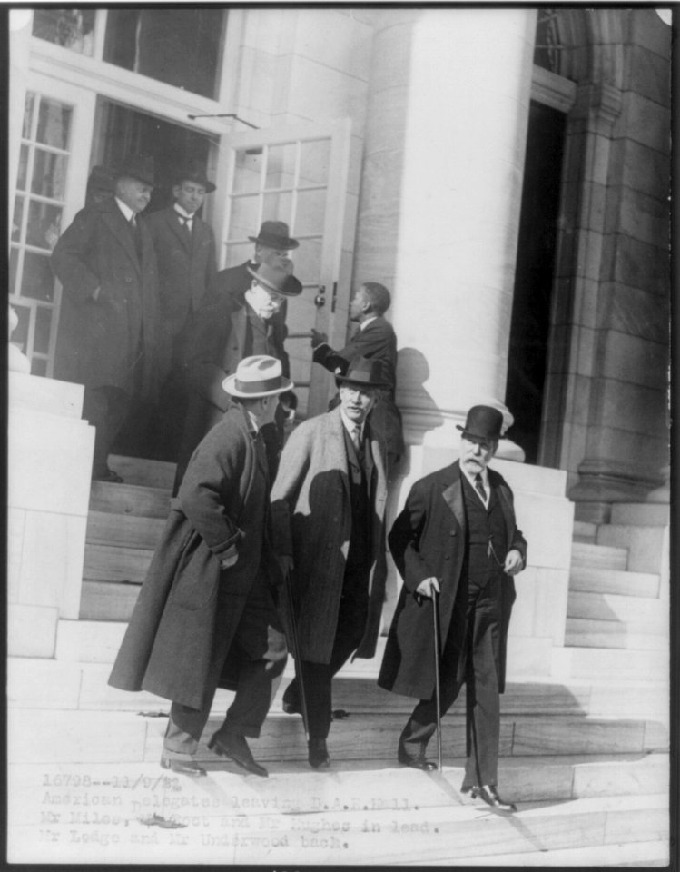 American delegates leaving D.A.R. Hall, Wash., D.C., during World Disarmament Conference, Sept. 11, 1921 - Senators Underwood and Lodge, Elihu Root, Charles Evans Hughes, and Basil Hughes LCCN2002697195