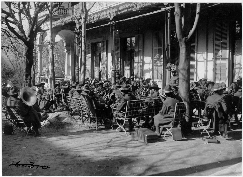 American Expeditionary Force correspondents. (African American) band playing in the gardens of the . . . - NARA - 533607