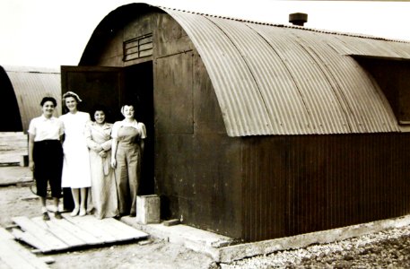 American nurses outside living quarters, a corrugated iron hut, somewhere in Iran, 1943 (24508178743)