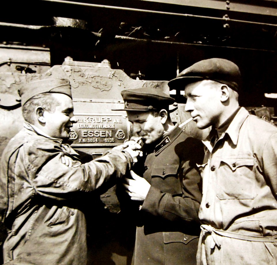 American soldier and Russian engineers with German locomotive, WWII (25109271746)