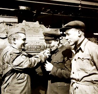 American soldier and Russian engineers with German locomotive, WWII (25109271746)