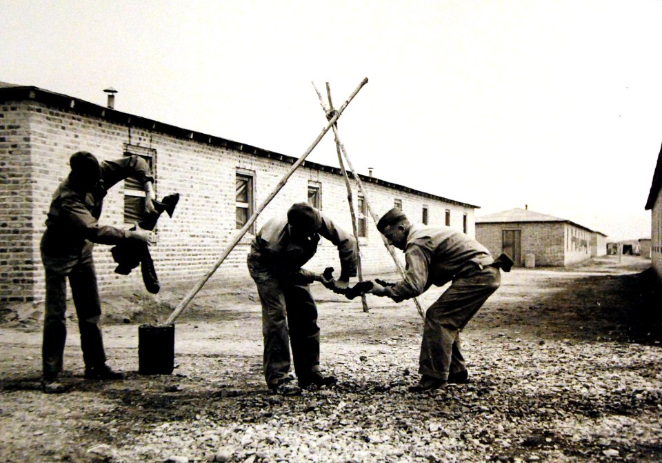 American troops who work on the railway washing out their clothes in Iran, WWII (25016781562)