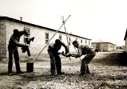 American troops who work on the railway washing out their clothes in Iran, WWII (25016781562)
