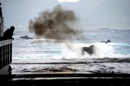 Amphibious assault vehicles depart USS Anchorage 140408-N-KL846-030 photo