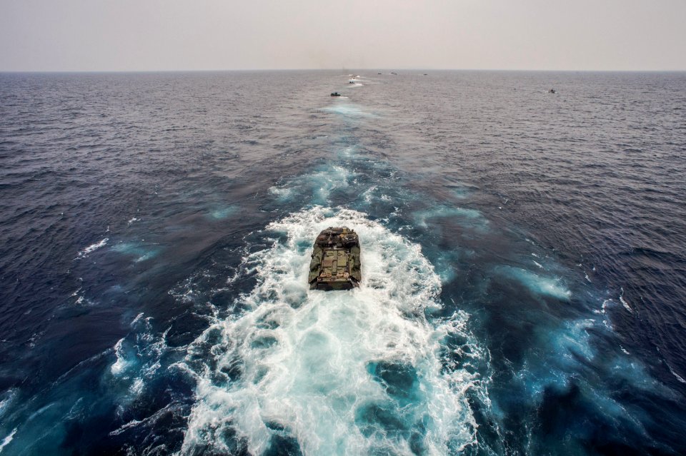 Amphibious assault vehicles launch from USS Bonhomme Richard 150304-N-UF697-027